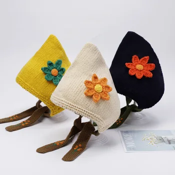Karsti pārdošanu Eiropas un Amerikas bērnu vilnas adīta cepure ar cute ziedu dizains, ideāls rudens un ziemas. Paredzēts, auss pro